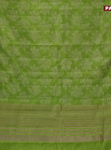 Semi raw silk saree light green with floral butta prints and zari woven border