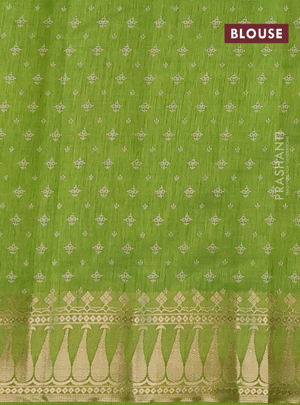 Semi raw silk saree light green with floral butta prints and zari woven border