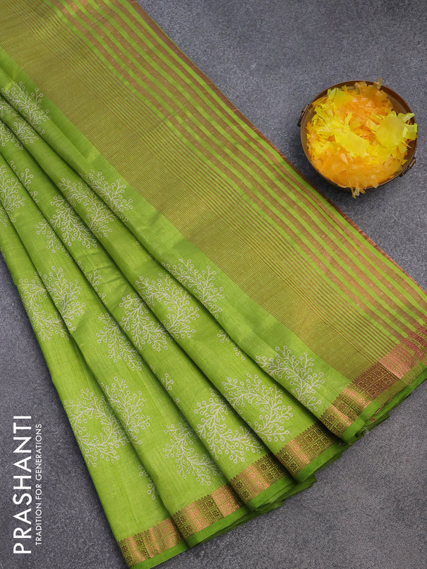 Semi raw silk saree light green with butta prints and copper zari woven border