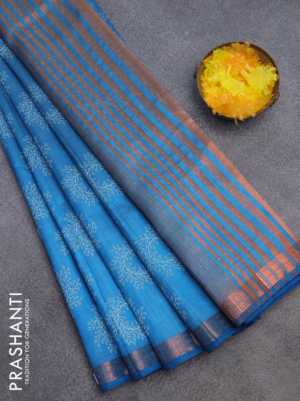 Semi raw silk saree cs blue with butta prints and copper zari woven border