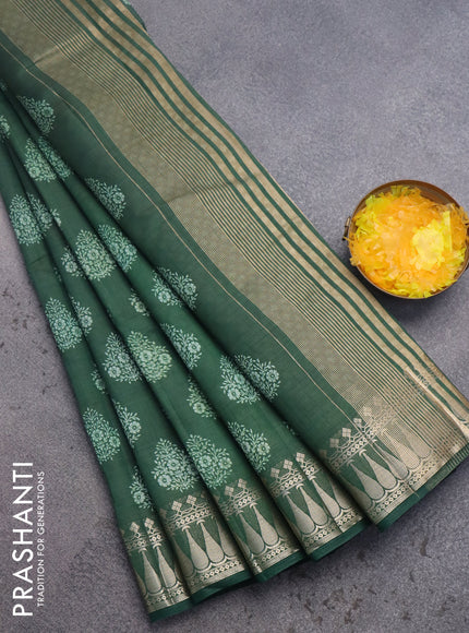 Semi raw silk saree bottle green with butta prints and zari woven border