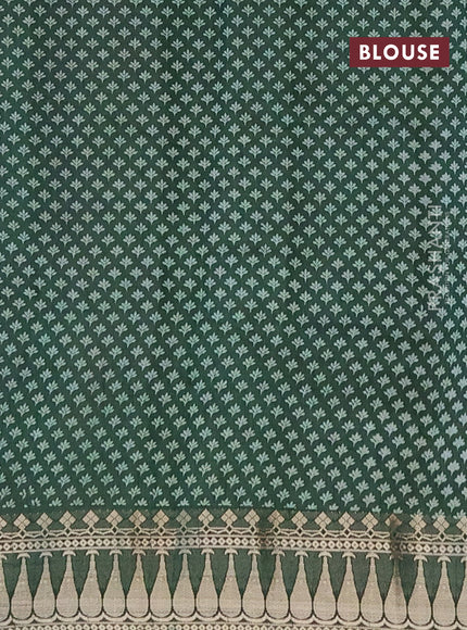 Semi raw silk saree bottle green with butta prints and zari woven border