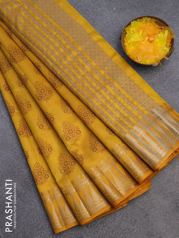 Semi raw silk saree mustard yellow with butta prints and zari woven border