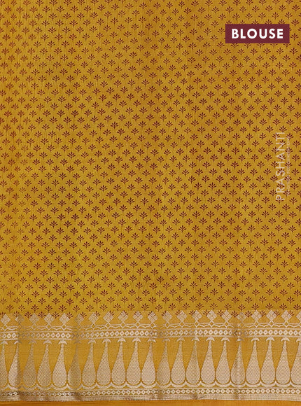 Semi raw silk saree mustard yellow with butta prints and zari woven border