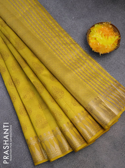 Semi raw silk saree mustard yellow with butta prints and zari woven border