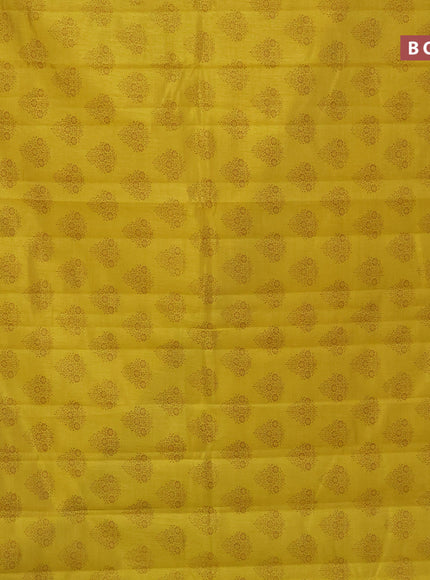 Semi raw silk saree mustard yellow with butta prints and zari woven border