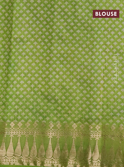 Semi raw silk saree mehendi green with butta prints and zari woven border