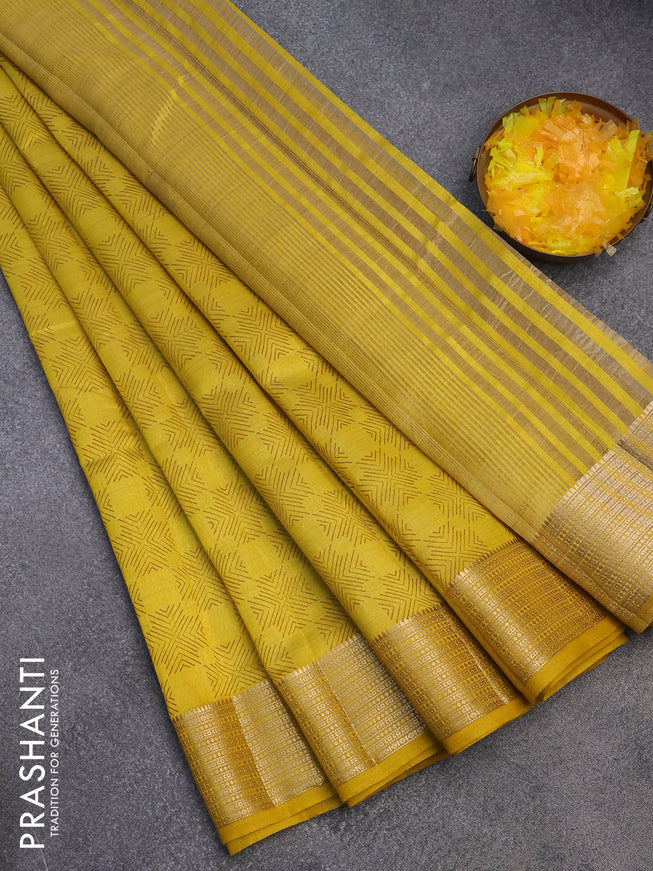 Semi raw silk saree yellow with allover prints and zari woven border