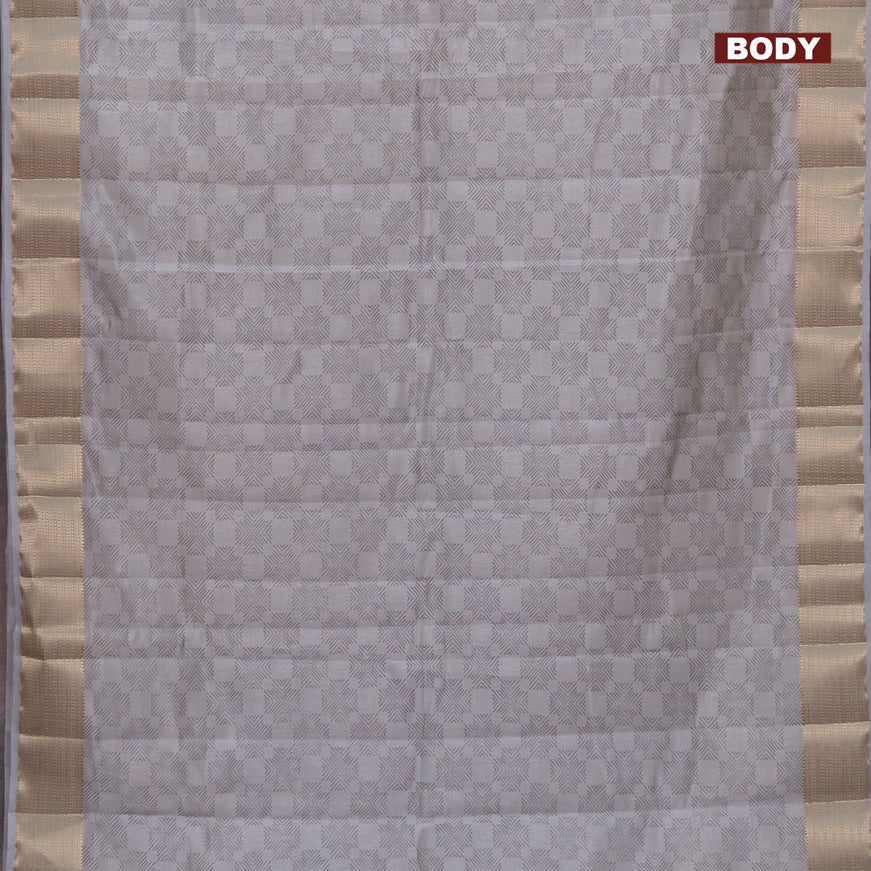 Semi raw silk saree pastel grey with allover prints and zari woven border