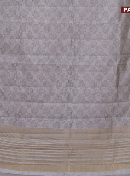 Semi raw silk saree pastel grey with allover prints and zari woven border