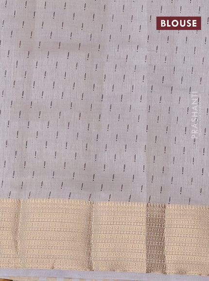 Semi raw silk saree pastel grey with allover prints and zari woven border