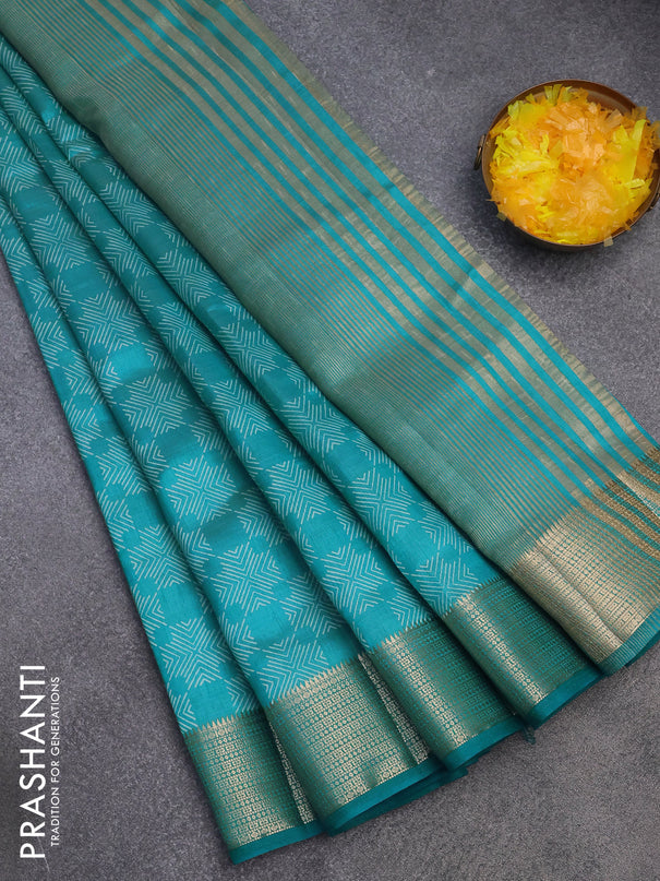 Semi raw silk saree teal blue with allover prints and zari woven border