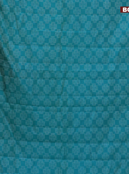 Semi raw silk saree teal blue with allover prints and zari woven border