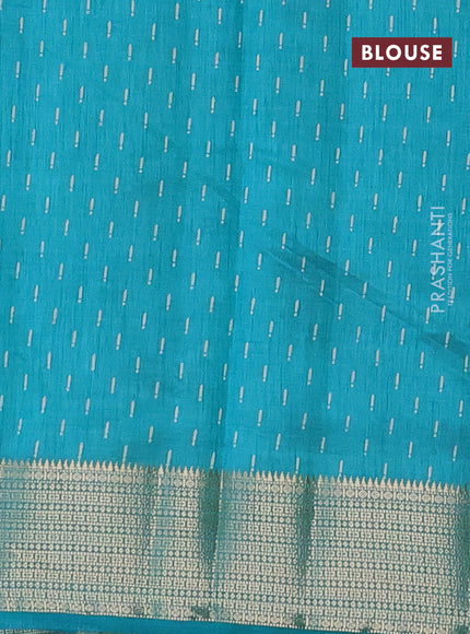 Semi raw silk saree teal blue with allover prints and zari woven border