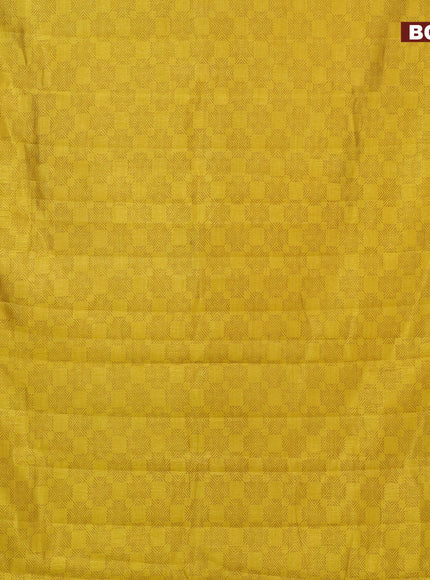 Semi raw silk saree yellow with allover prints and zari woven border