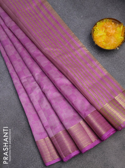 Semi raw silk saree lavender with allover prints and zari woven border