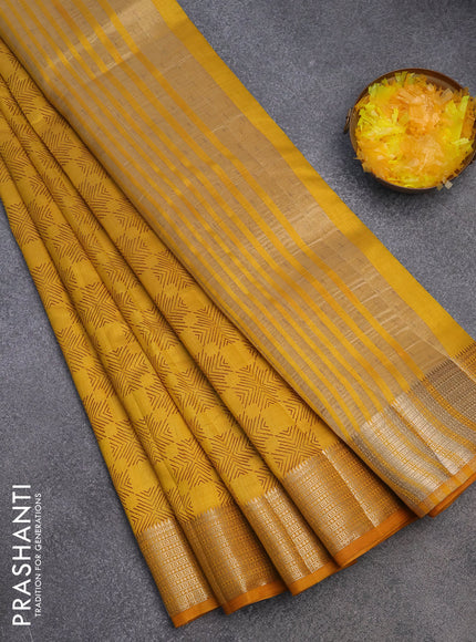 Semi raw silk saree mustrad yellow with allover prints and zari woven border