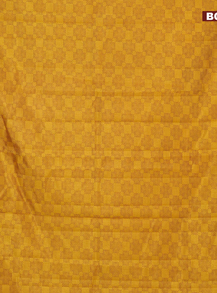 Semi raw silk saree mustrad yellow with allover prints and zari woven border