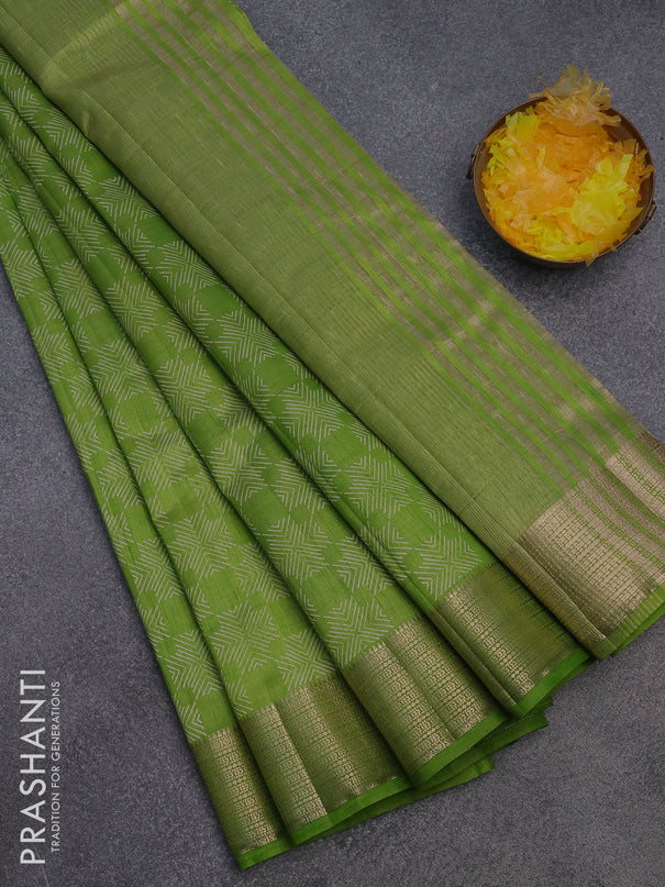 Semi raw silk saree light green with allover prints and zari woven border