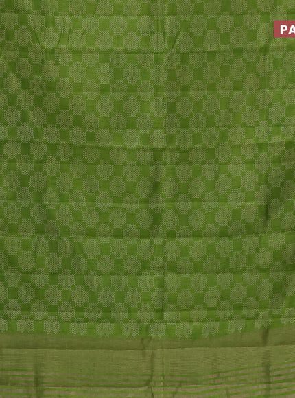 Semi raw silk saree light green with allover prints and zari woven border