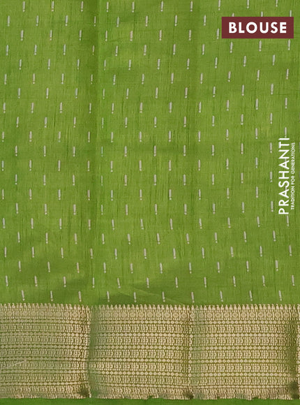 Semi raw silk saree light green with allover prints and zari woven border