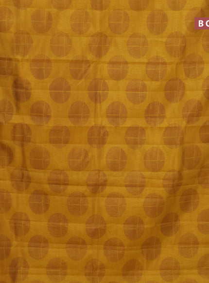 Semi raw silk saree mustard yellow with butta prints and zari woven border