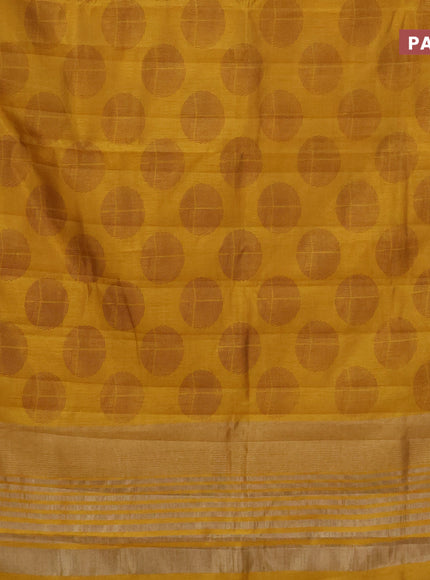 Semi raw silk saree mustard yellow with butta prints and zari woven border