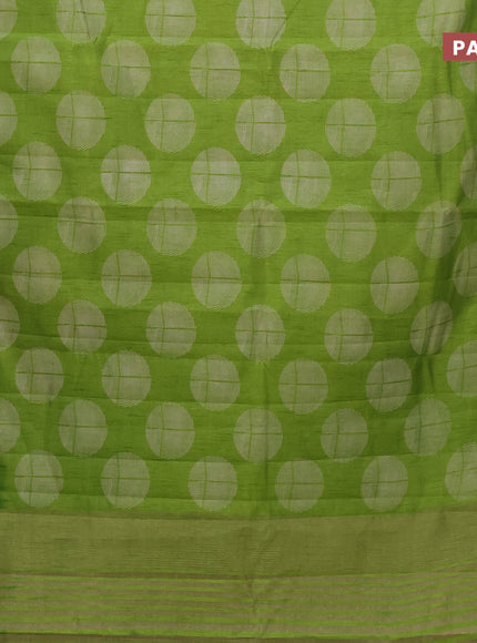 Semi raw silk saree light green with butta prints and zari woven border