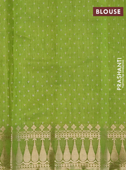 Semi raw silk saree light green with butta prints and zari woven border