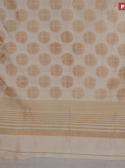 Semi raw silk saree cream with butta prints and zari woven border