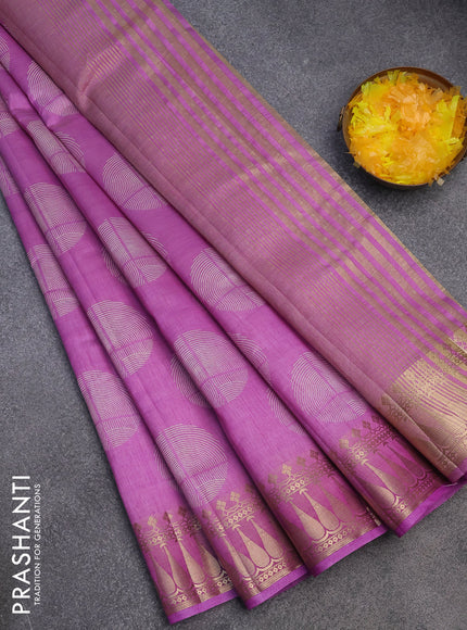 Semi raw silk saree lavender with butta prints and zari woven border