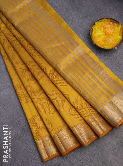 Semi raw silk saree mustard yellow with butta prints and zari woven border