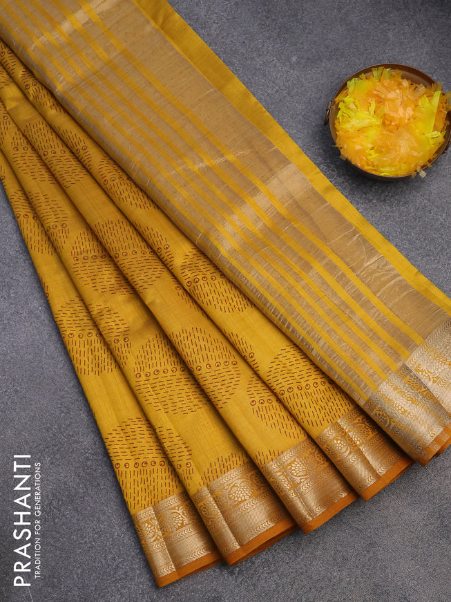 Semi raw silk saree mustard yellow with butta prints and zari woven border