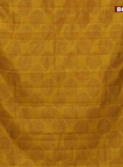 Semi raw silk saree mustard yellow with butta prints and zari woven border