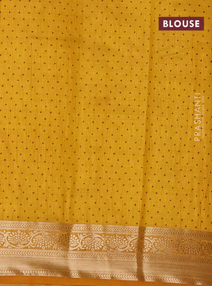 Semi raw silk saree mustard yellow with butta prints and zari woven border