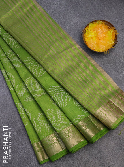 Semi raw silk saree light green with butta prints and zari woven border