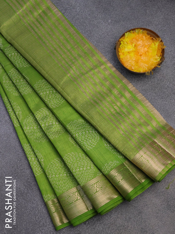 Semi raw silk saree light green with butta prints and zari woven border