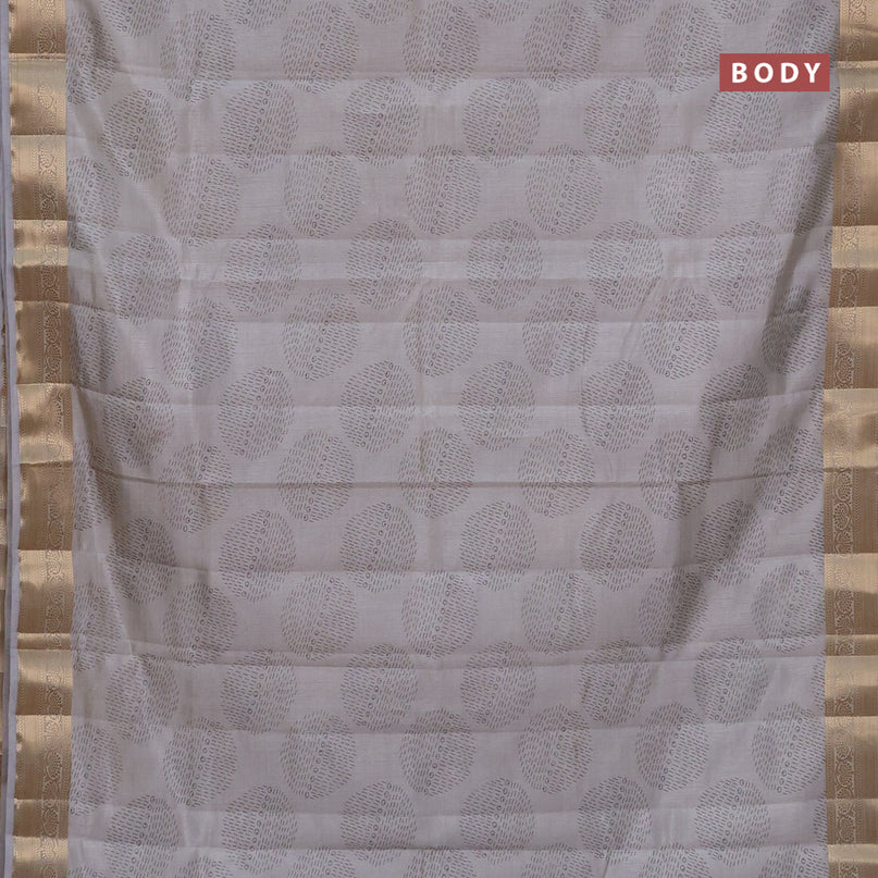 Semi raw silk saree pastel grey with butta prints and zari woven border