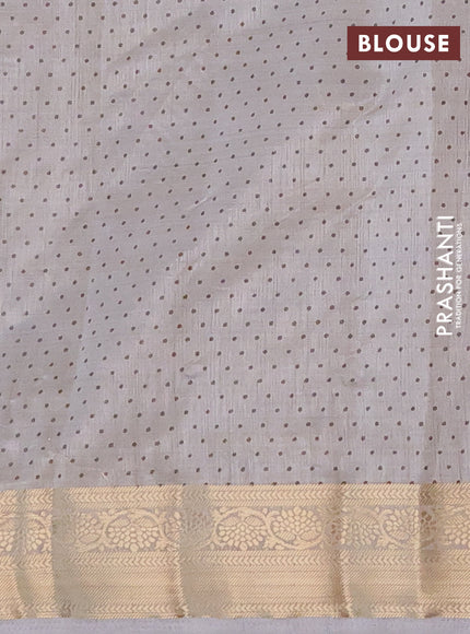 Semi raw silk saree pastel grey with butta prints and zari woven border