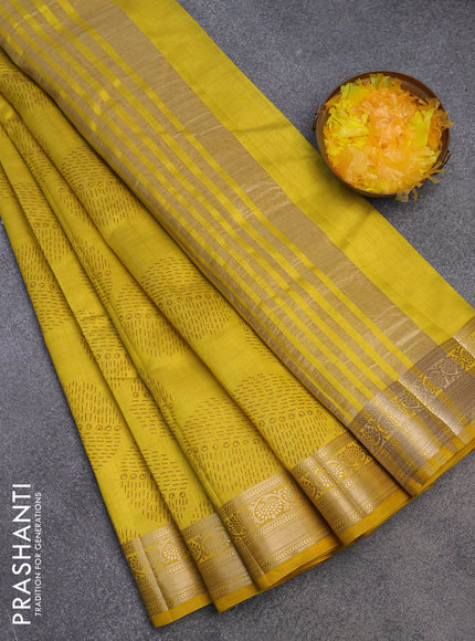 Semi raw silk saree yellow with butta prints and zari woven border