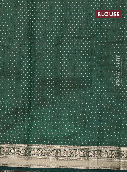 Semi raw silk saree bottle green with butta prints and zari woven border