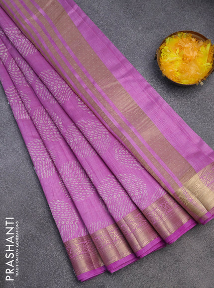 Semi raw silk saree lavender with butta prints and zari woven border