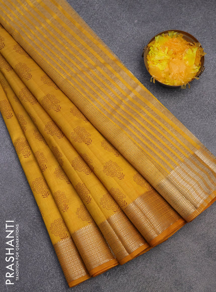 Semi raw silk saree mustard yellow with floral butta prints and zari woven border