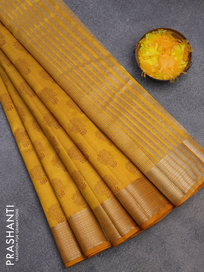 Semi raw silk saree mustard yellow with floral butta prints and zari woven border