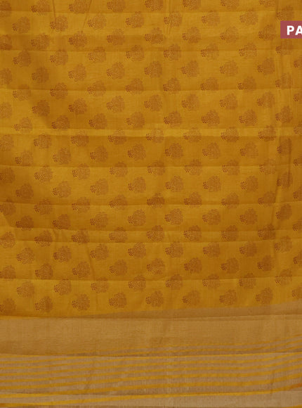 Semi raw silk saree mustard yellow with floral butta prints and zari woven border