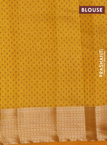 Semi raw silk saree mustard yellow with floral butta prints and zari woven border