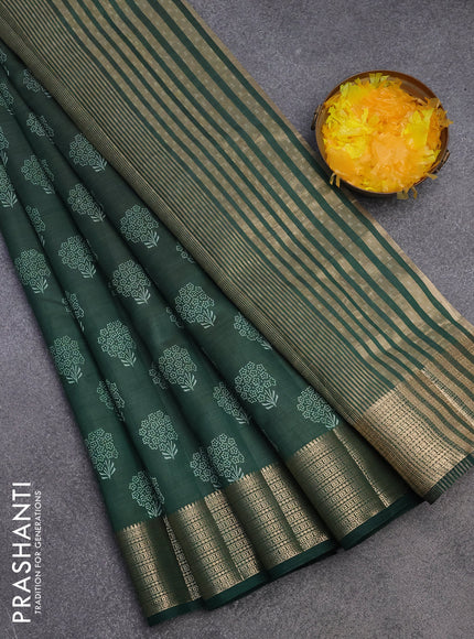 Semi raw silk saree bottle green with floral butta prints and zari woven border