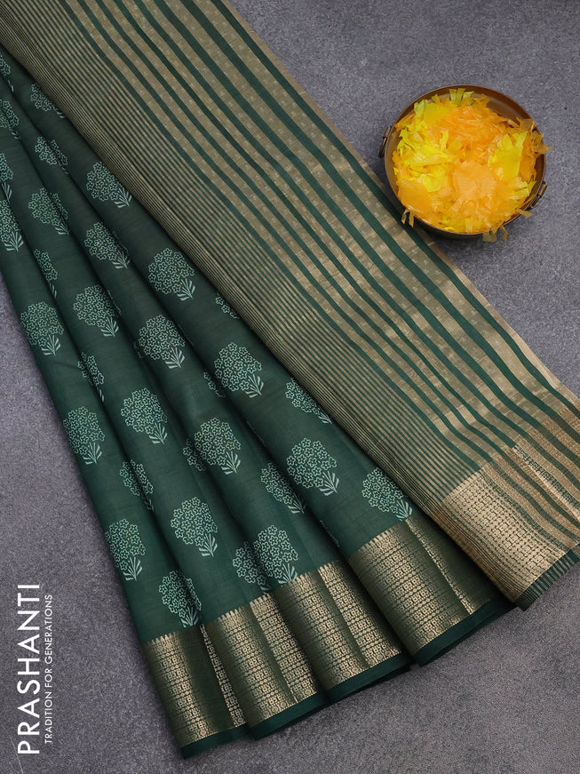 Semi raw silk saree bottle green with floral butta prints and zari woven border