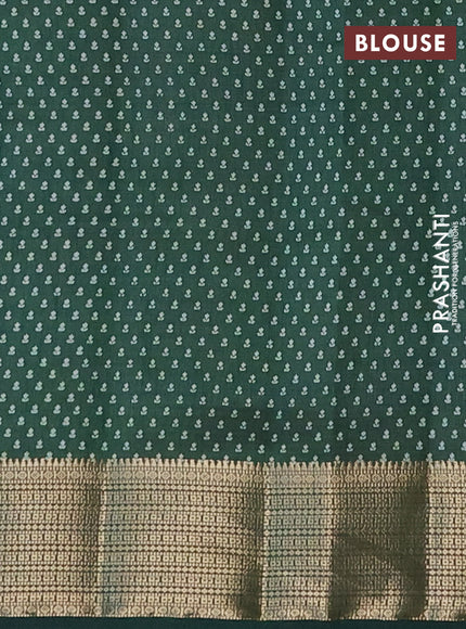 Semi raw silk saree bottle green with floral butta prints and zari woven border