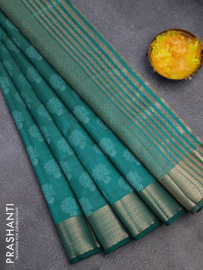 Semi raw silk saree teal green shade with floral butta prints and zari woven border